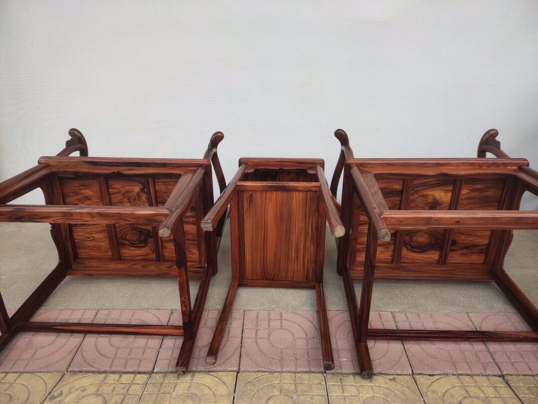 A set of Chinese antique rosewood official hat chairs