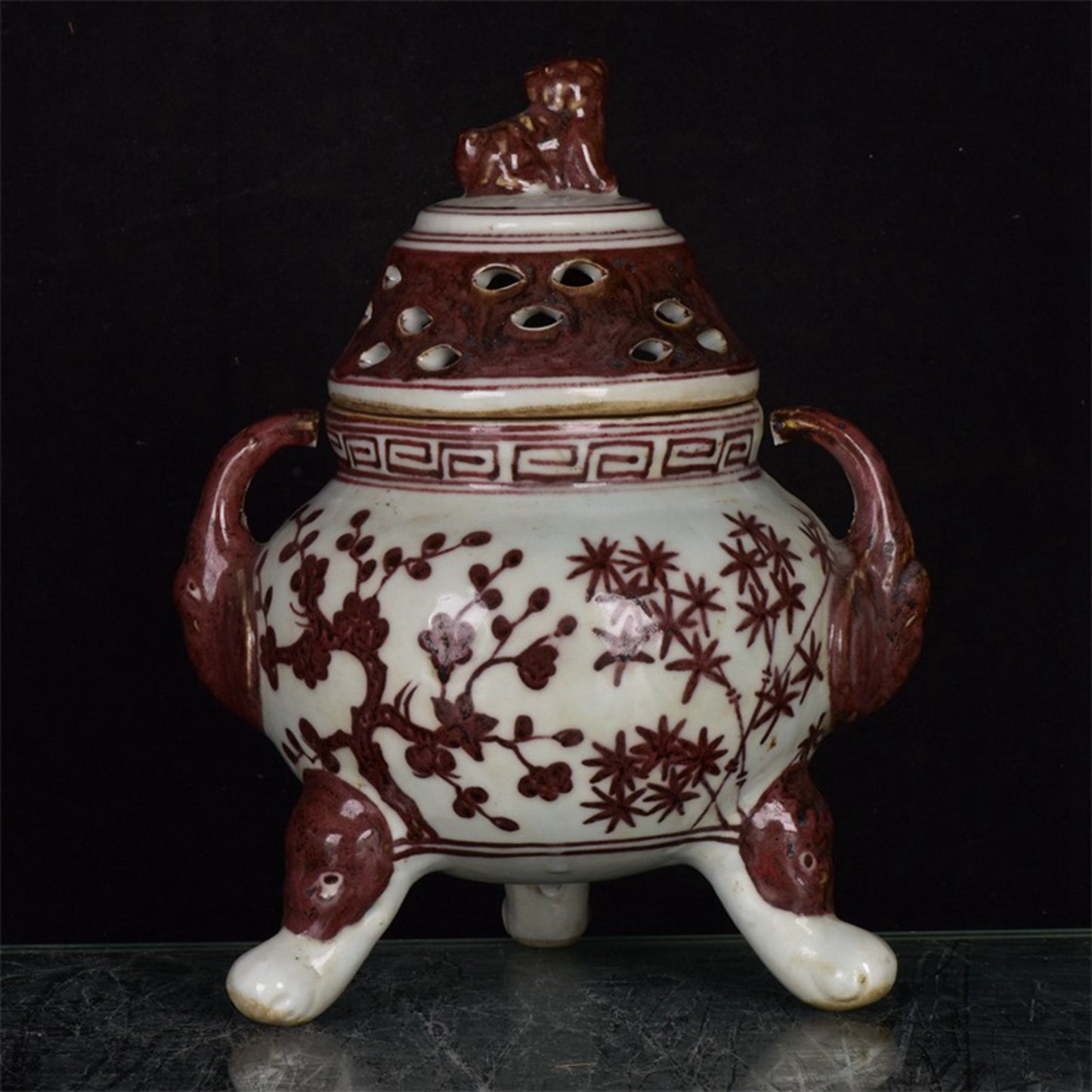 Chinese antique patterned three legged double ear incense burner