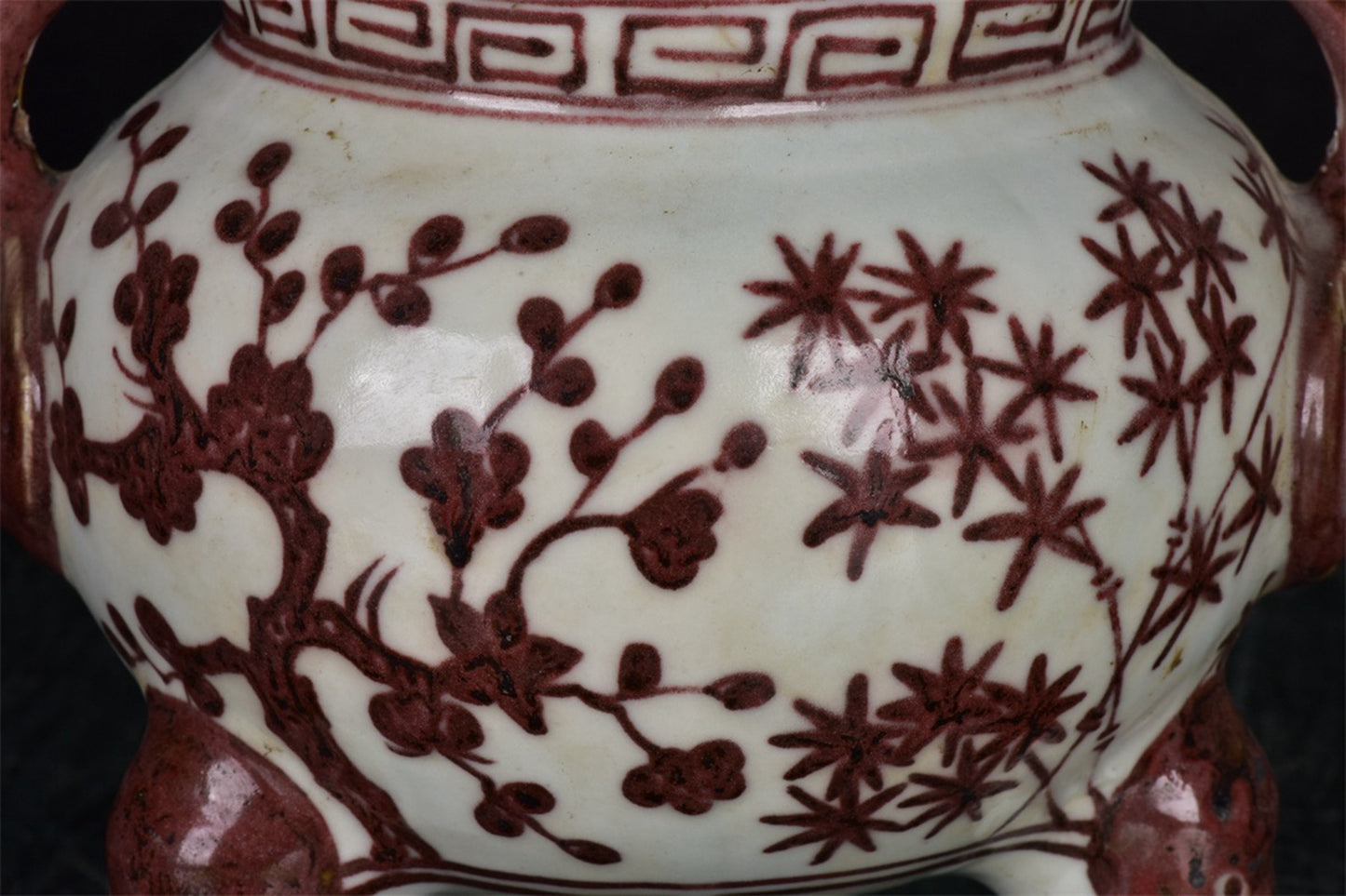 Chinese antique patterned three legged double ear incense burner
