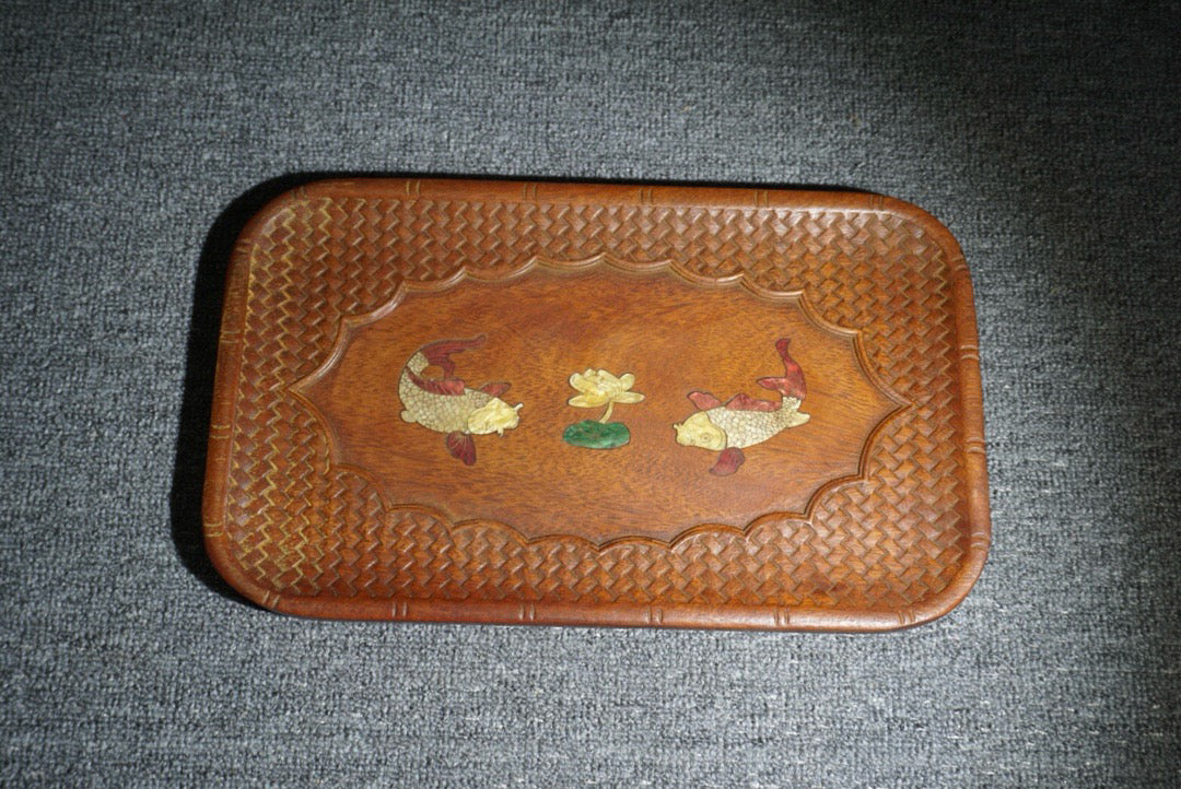 Chinese antique rosewood inlaid with seashells, with over a year of tea plates