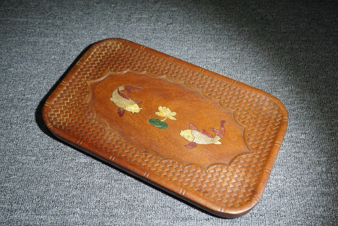 Chinese antique rosewood inlaid with seashells, with over a year of tea plates