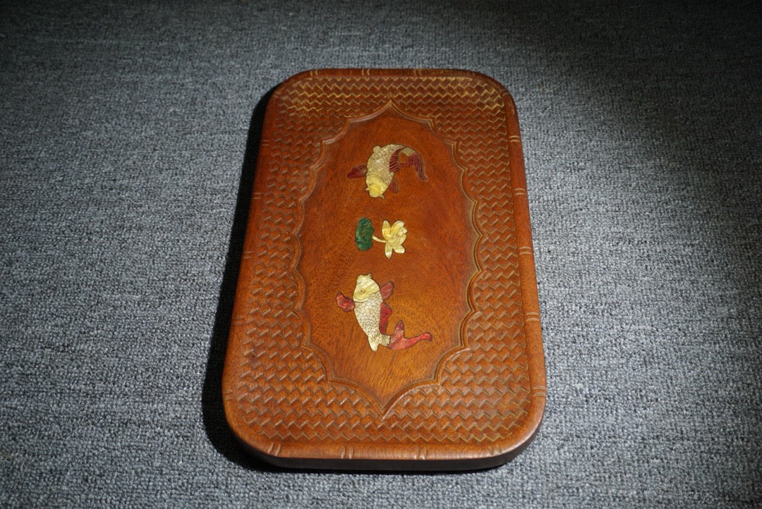 Chinese antique rosewood inlaid with seashells, with over a year of tea plates