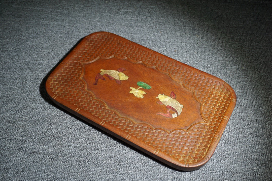 Chinese antique rosewood inlaid with seashells, with over a year of tea plates