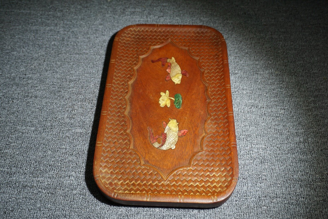 Chinese antique rosewood inlaid with seashells, with over a year of tea plates