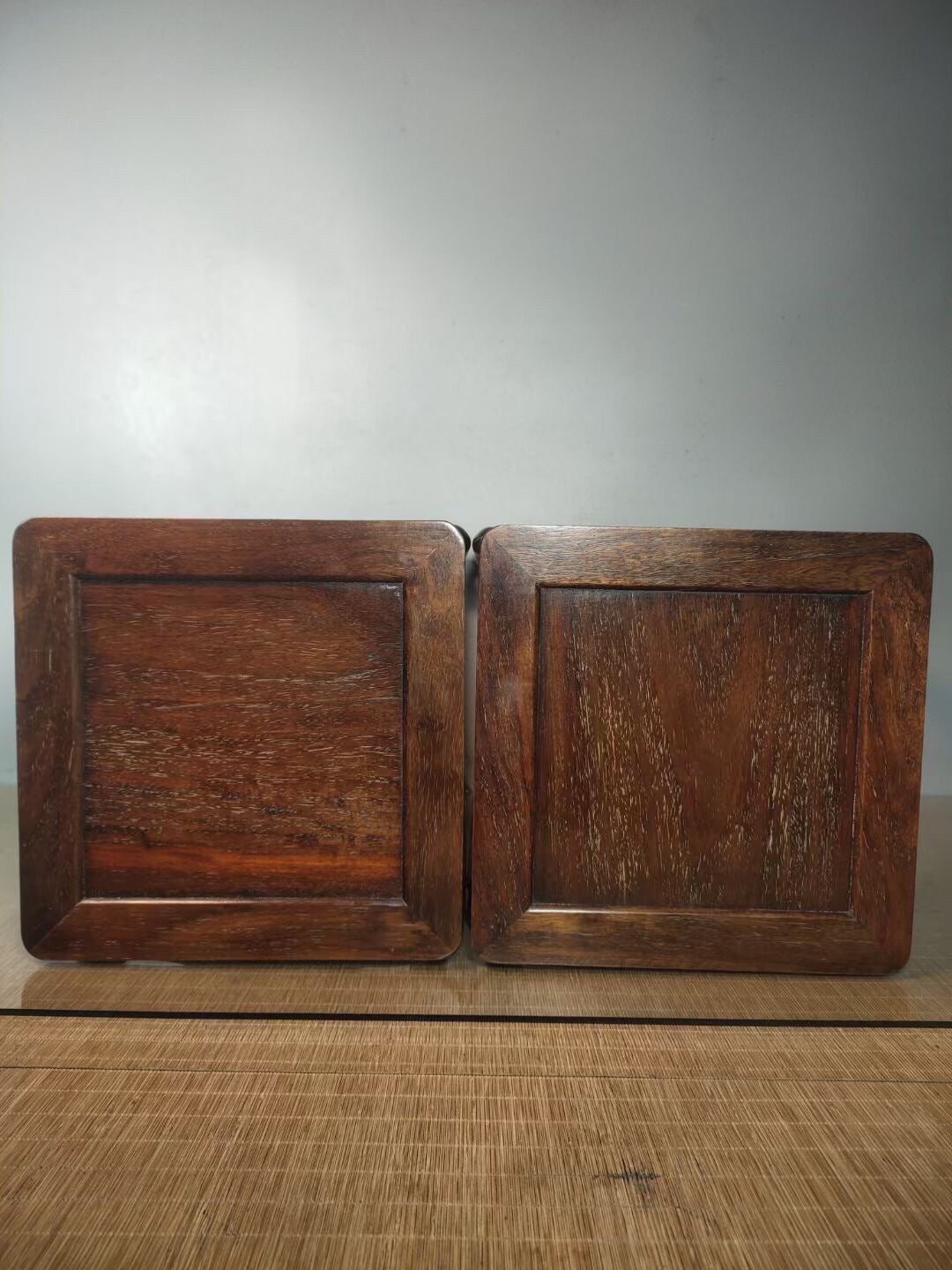 A pair of antique Chinese pear wood flower racks