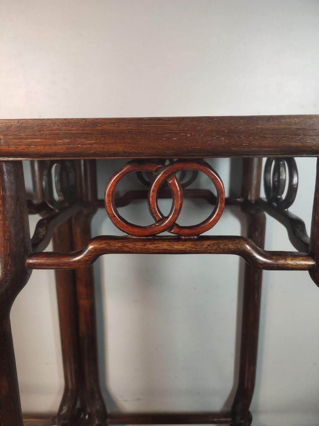 A pair of antique Chinese pear wood flower racks