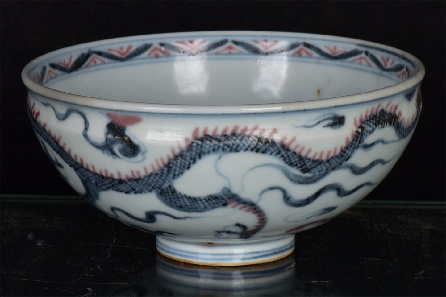 Chinese antique blue and white glazed red dragon patterned bowl