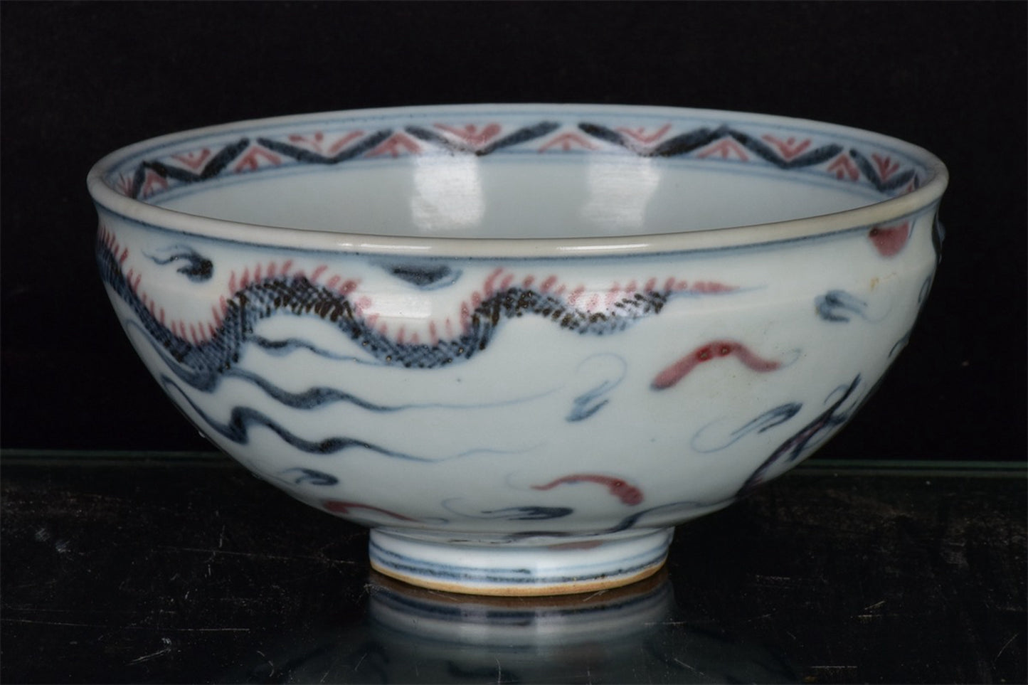 Chinese antique blue and white glazed red dragon patterned bowl