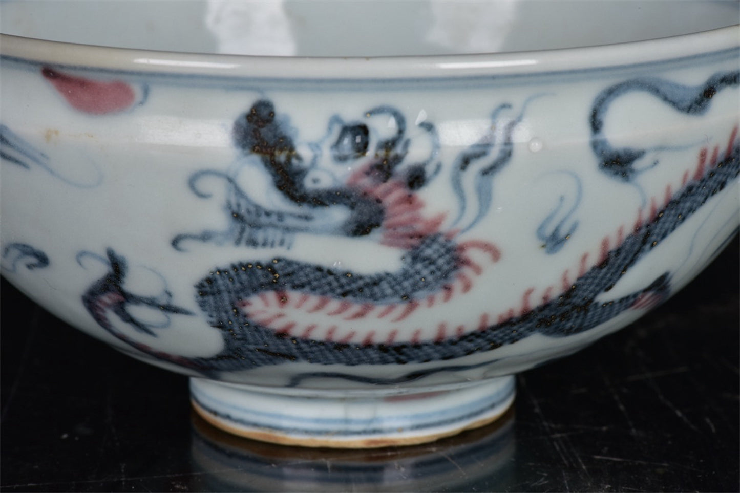 Chinese antique blue and white glazed red dragon patterned bowl