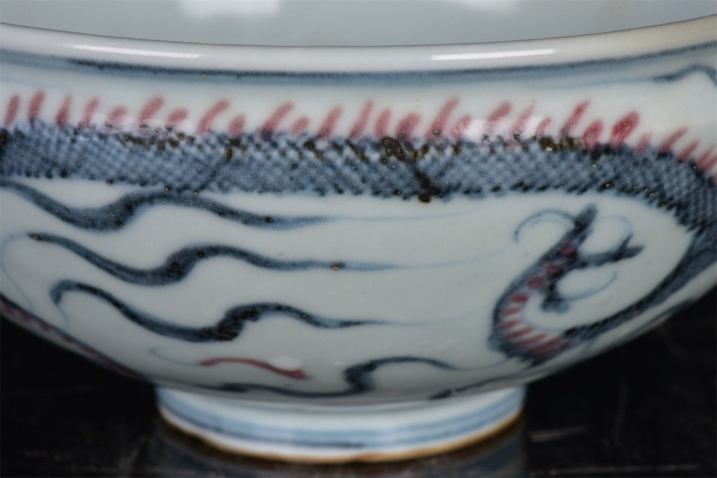 Chinese antique blue and white glazed red dragon patterned bowl