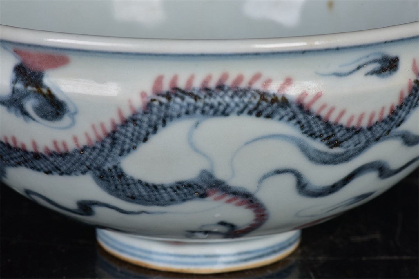 Chinese antique blue and white glazed red dragon patterned bowl
