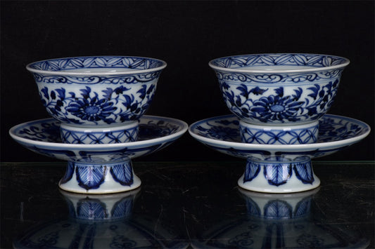 Chinese antique blue and white tea cups with tangled branches and floral patterns
