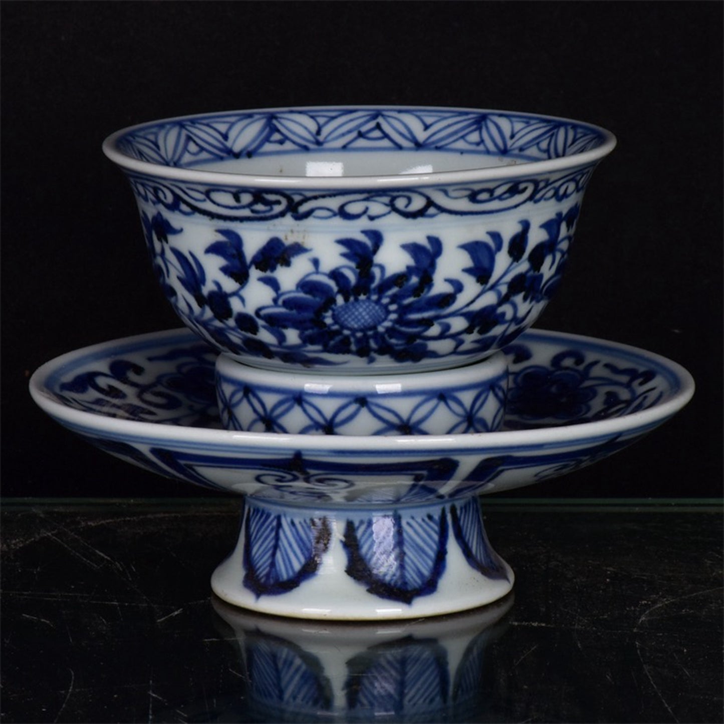 Chinese antique blue and white tea cups with tangled branches and floral patterns