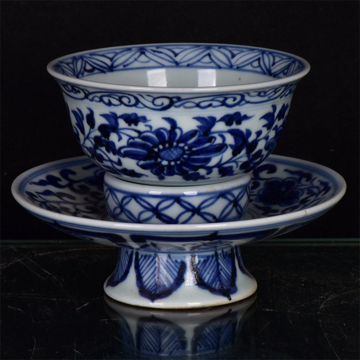 Chinese antique blue and white tea cups with tangled branches and floral patterns