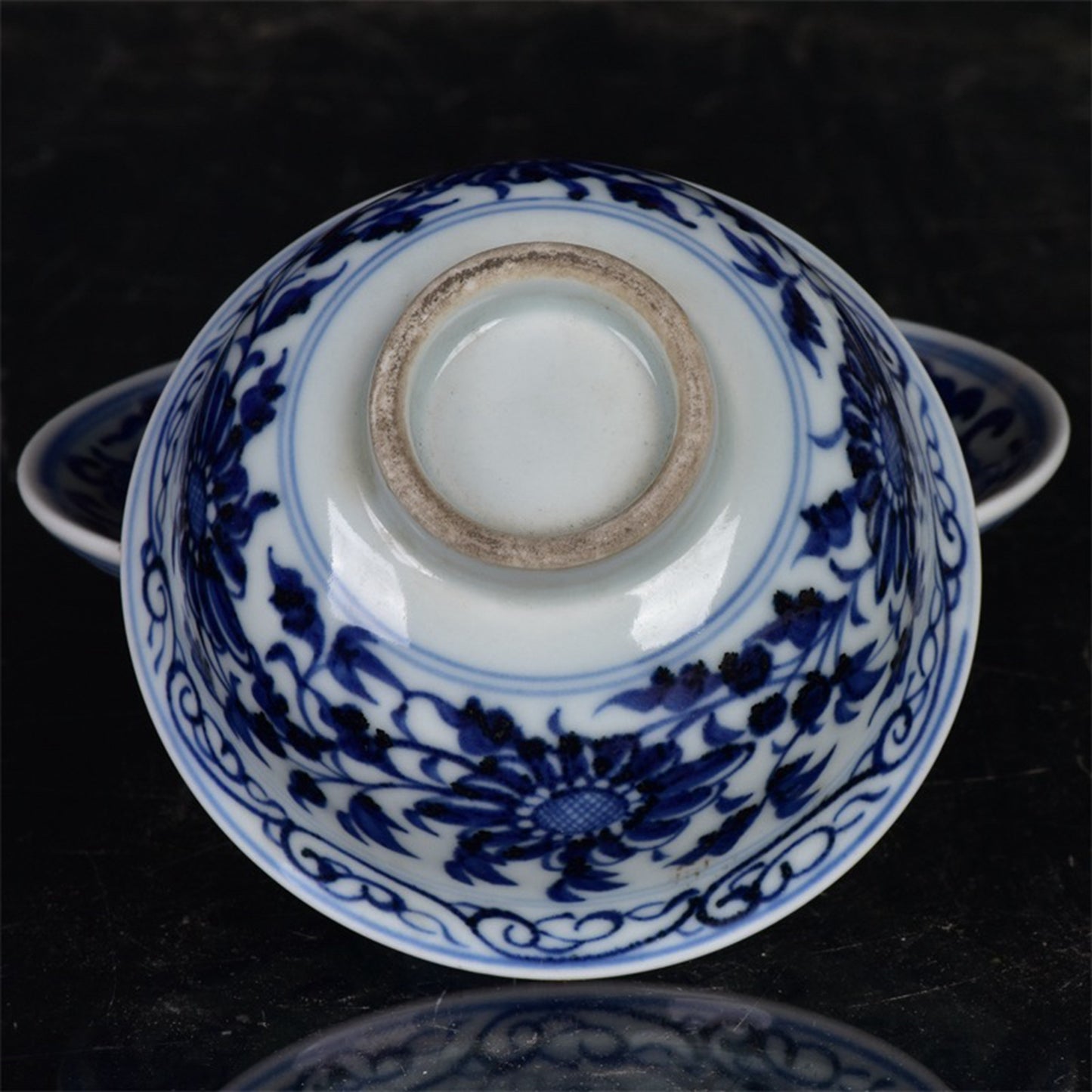 Chinese antique blue and white tea cups with tangled branches and floral patterns