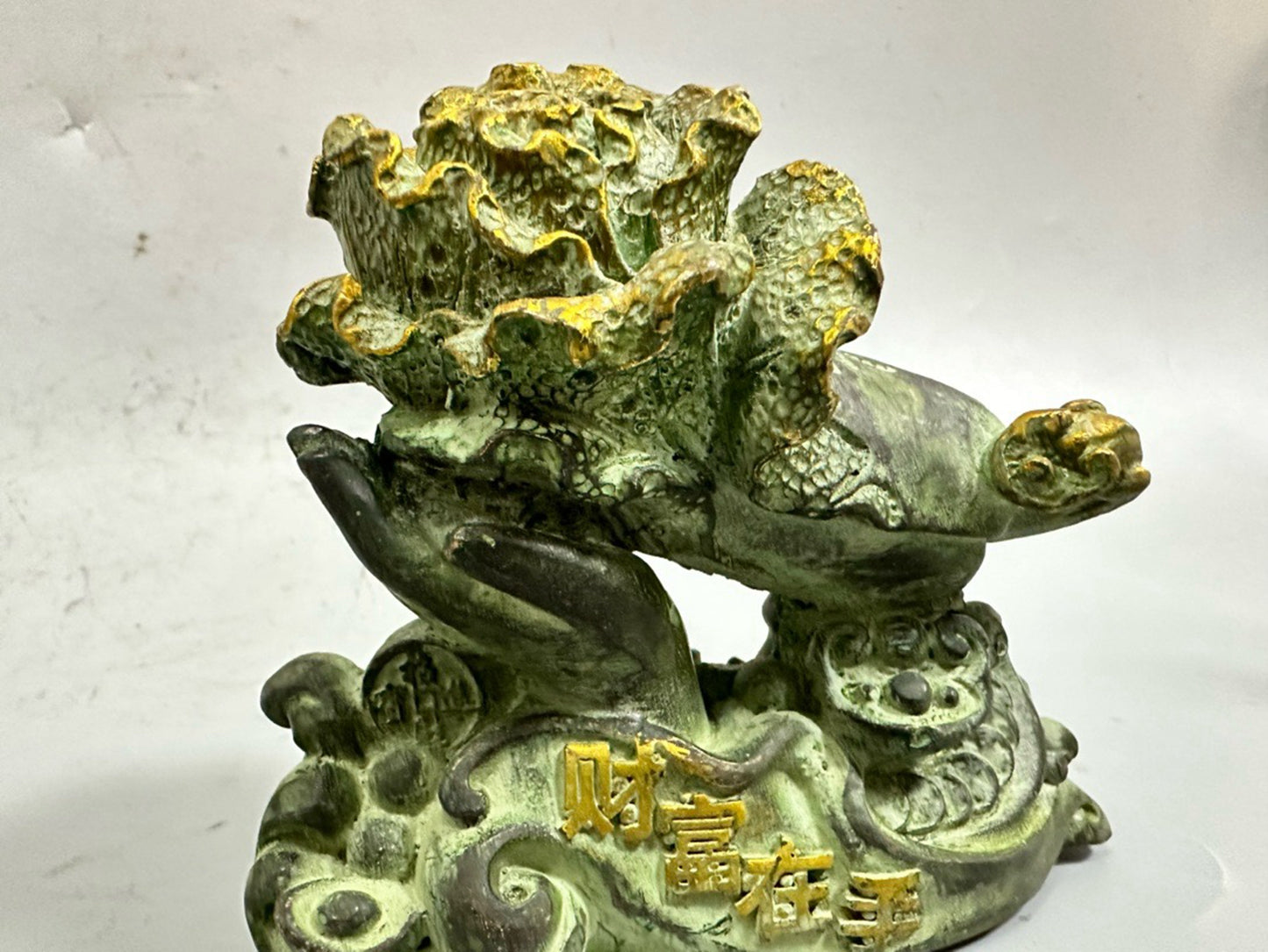 Pure copper antique gilded wealth in hand