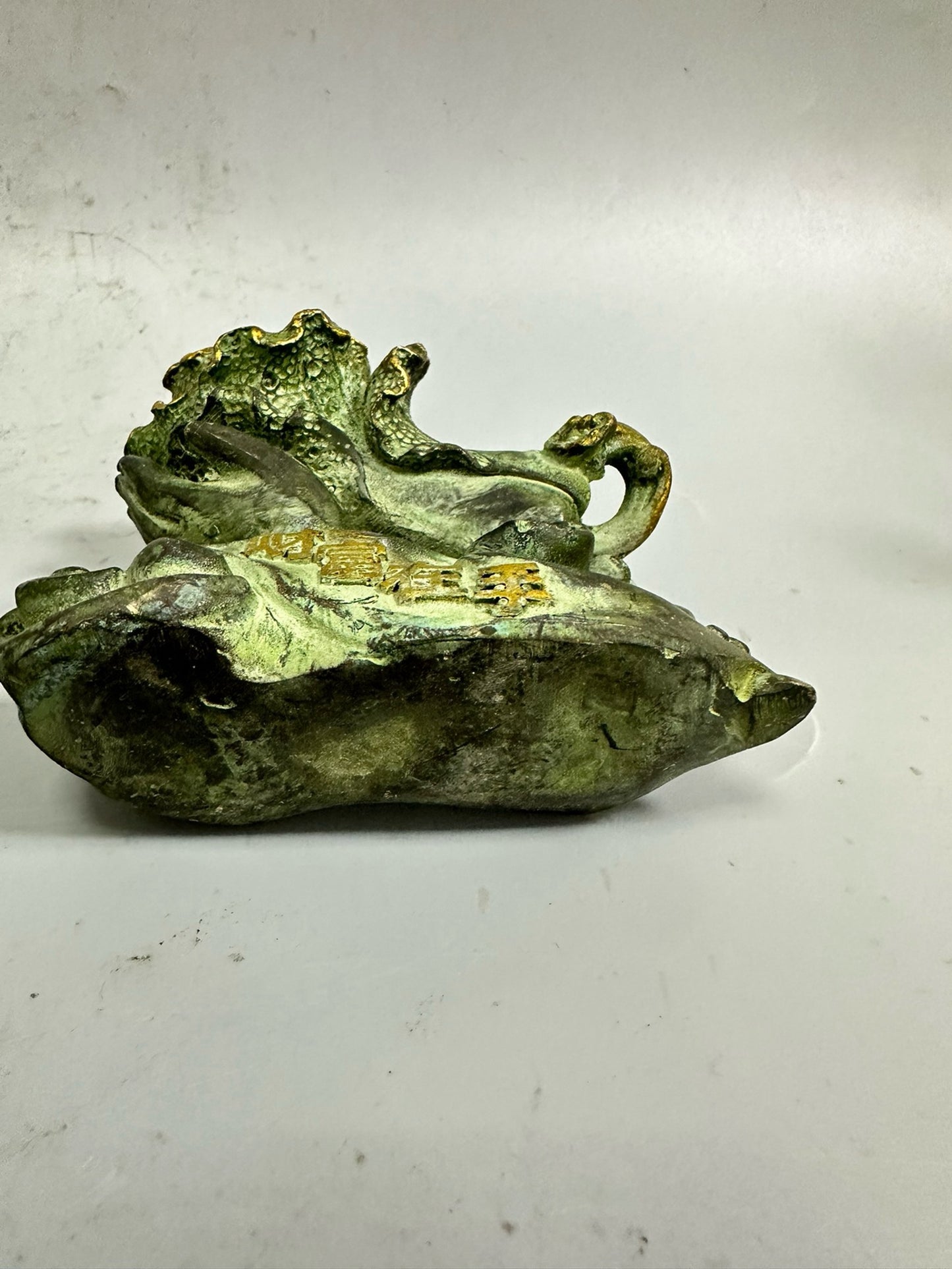 Pure copper antique gilded wealth in hand