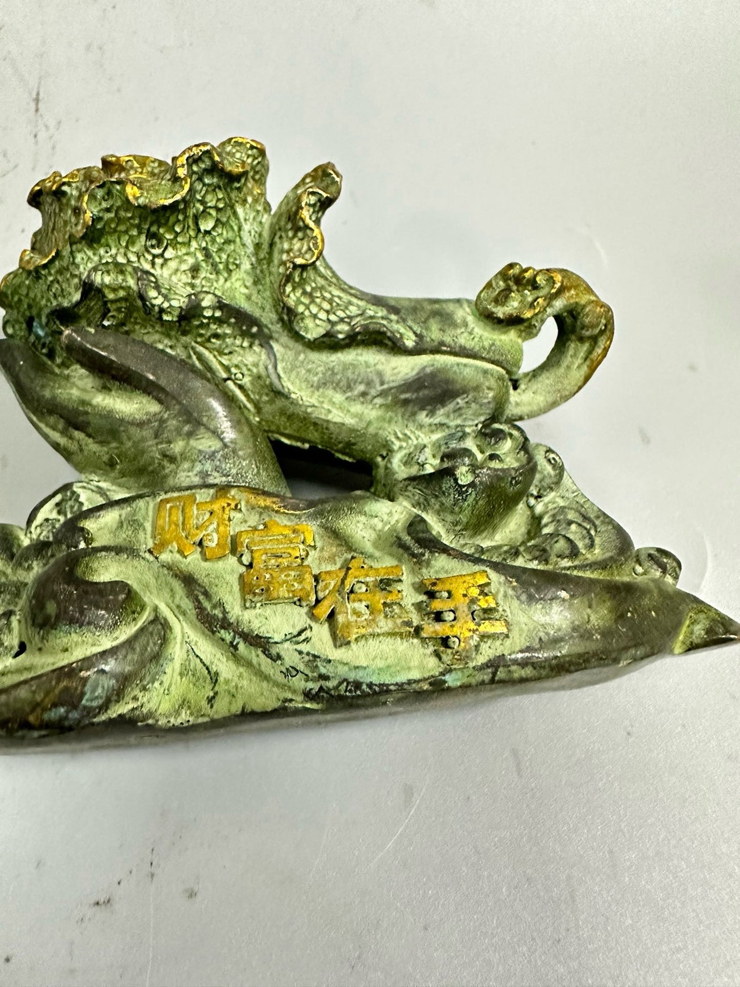 Pure copper antique gilded wealth in hand