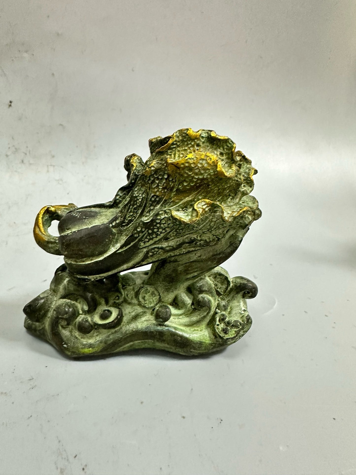 Pure copper antique gilded wealth in hand