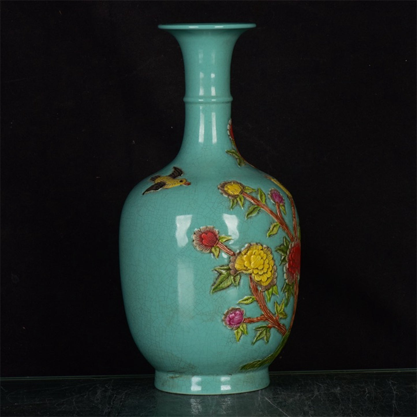 Chinese antique vase with flower and bird patterns