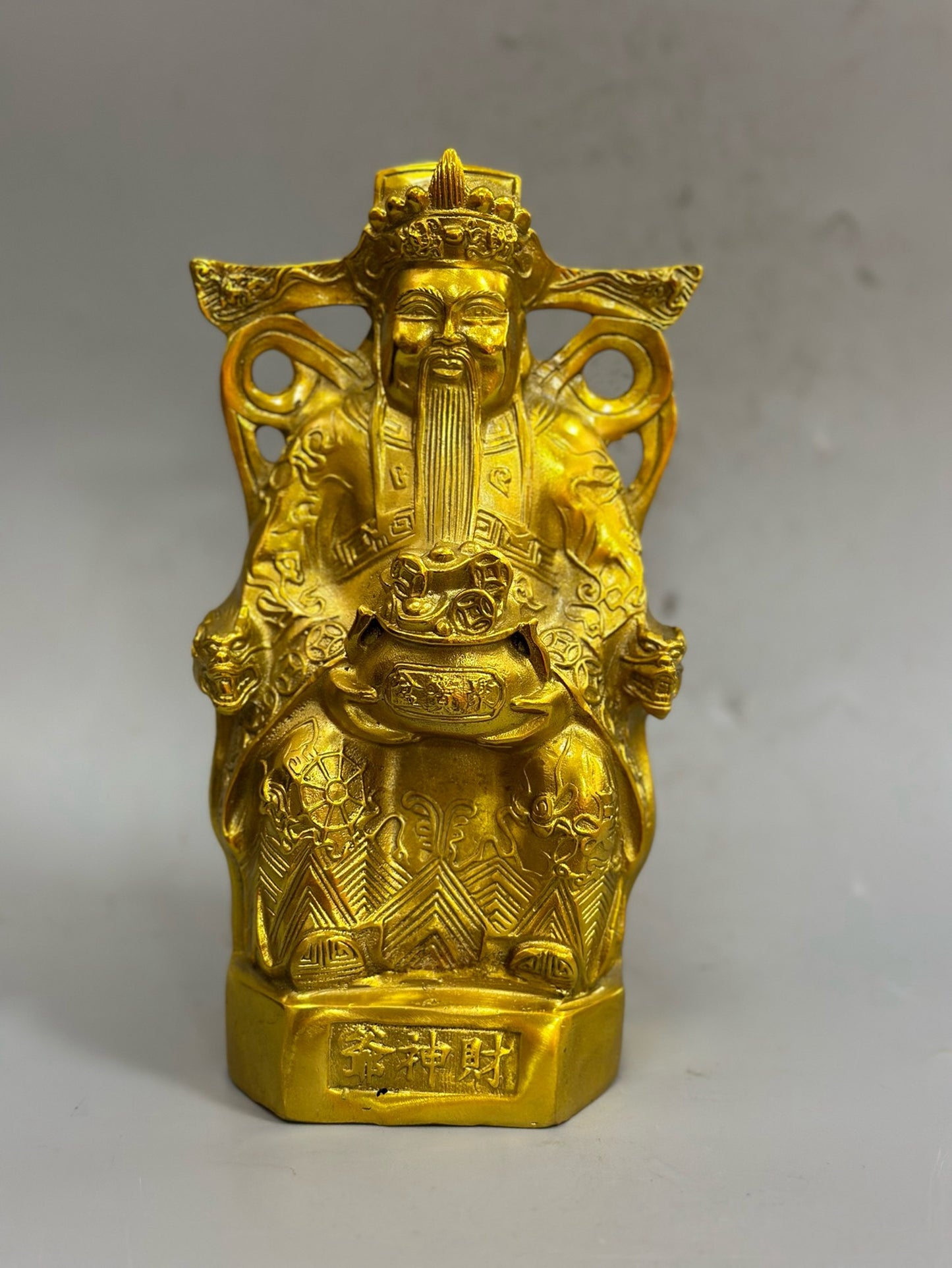 Pure copper craftsmanship sitting on the God of Wealth