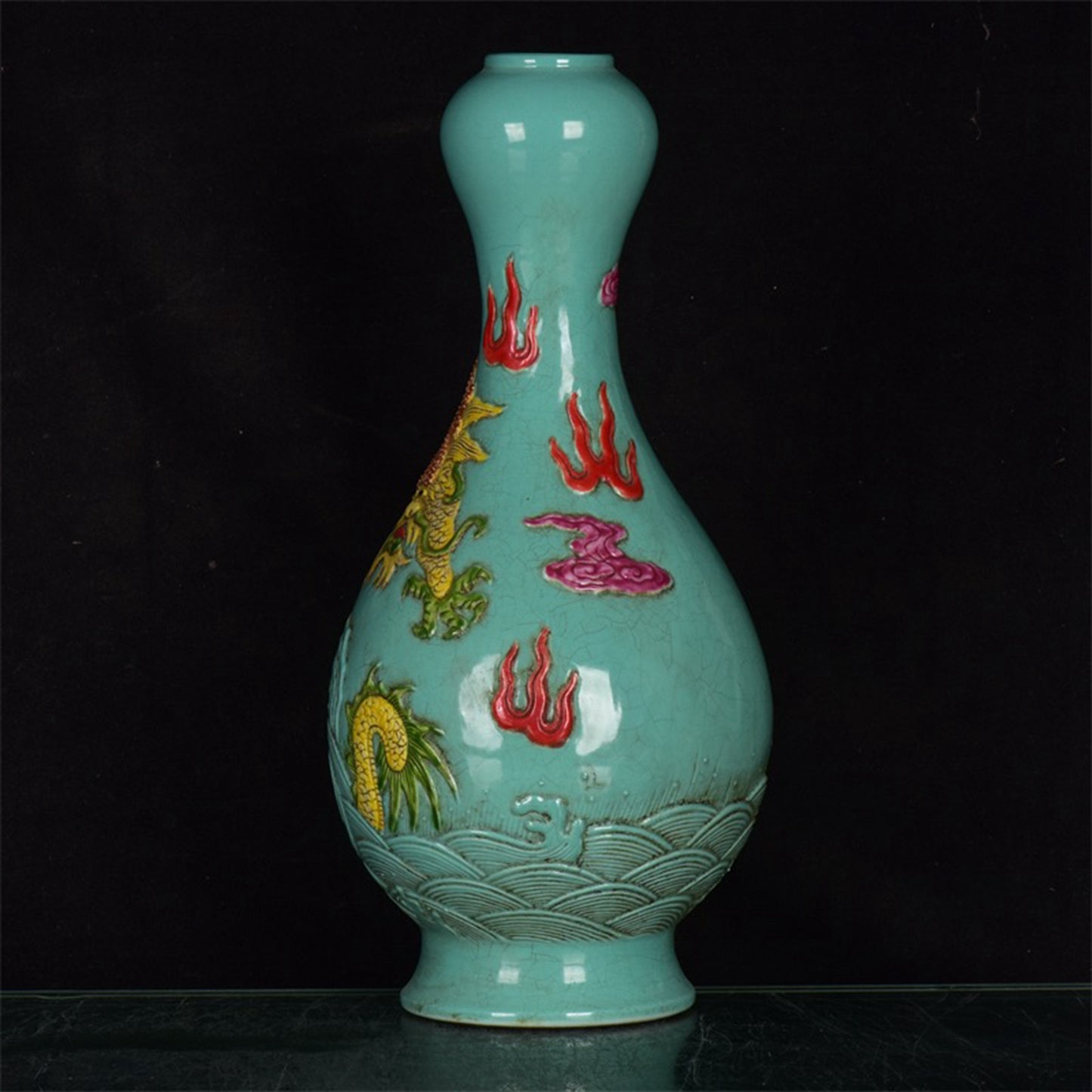 Chinese antique blue glazed relief dragon patterned garlic bottle