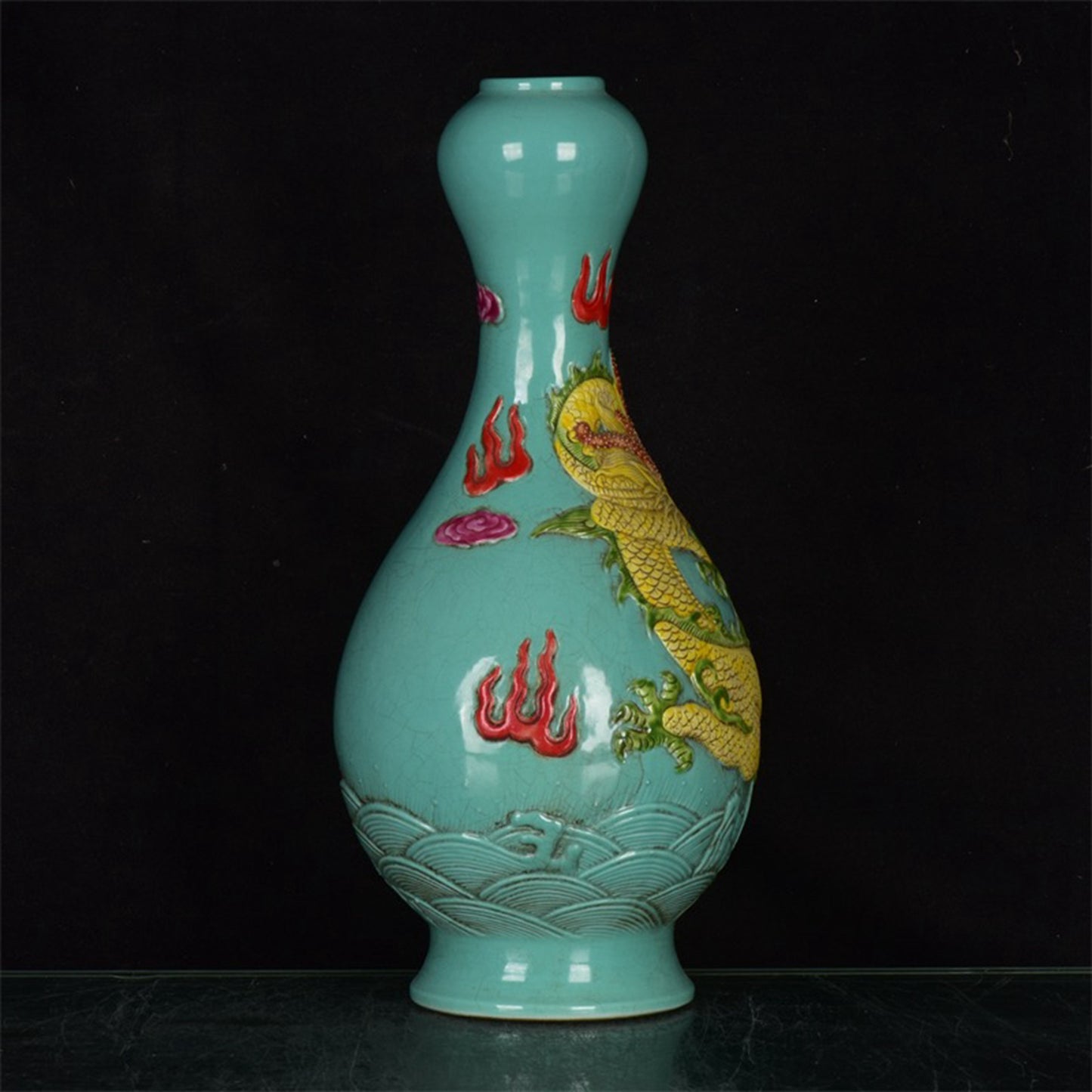 Chinese antique blue glazed relief dragon patterned garlic bottle
