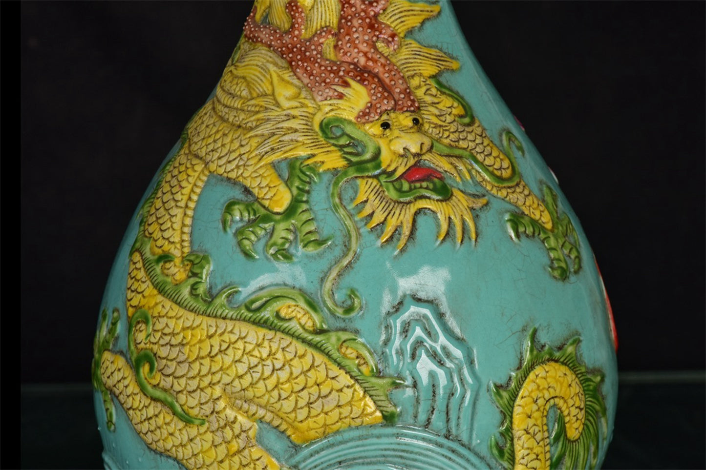 Chinese antique blue glazed relief dragon patterned garlic bottle