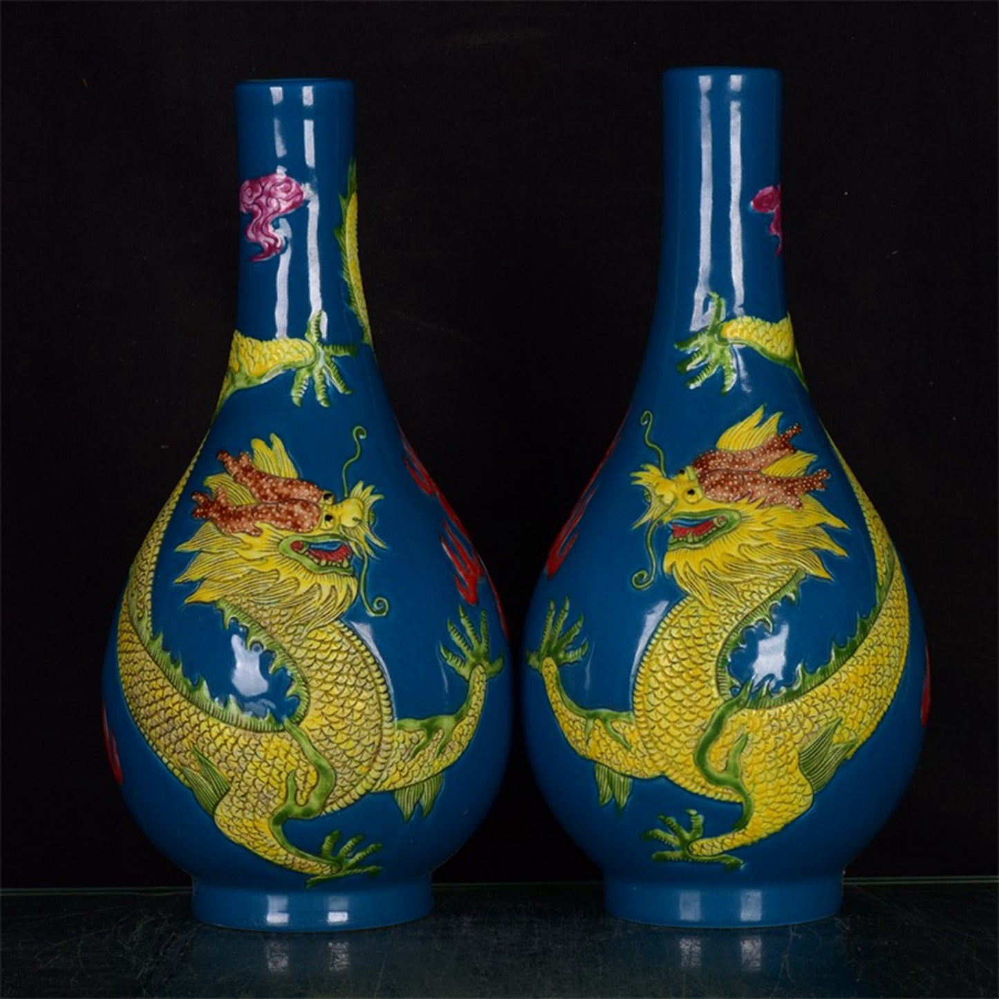 Chinese antique dragon patterned long neck relief bottle