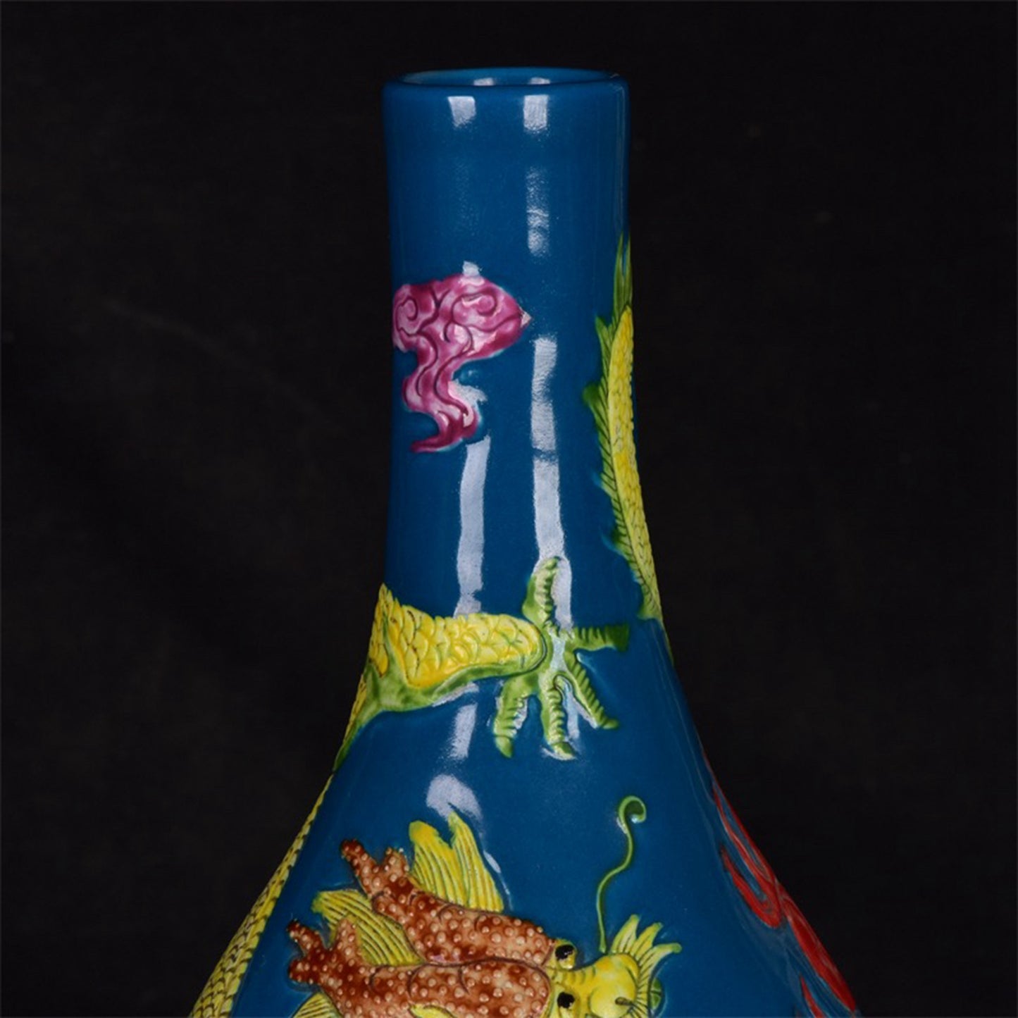 Chinese antique dragon patterned long neck relief bottle