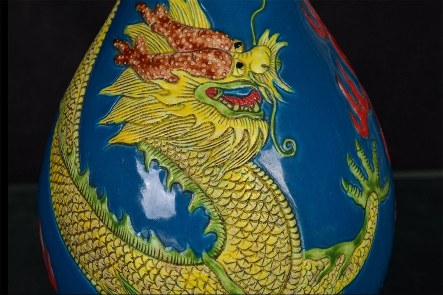 Chinese antique dragon patterned long neck relief bottle