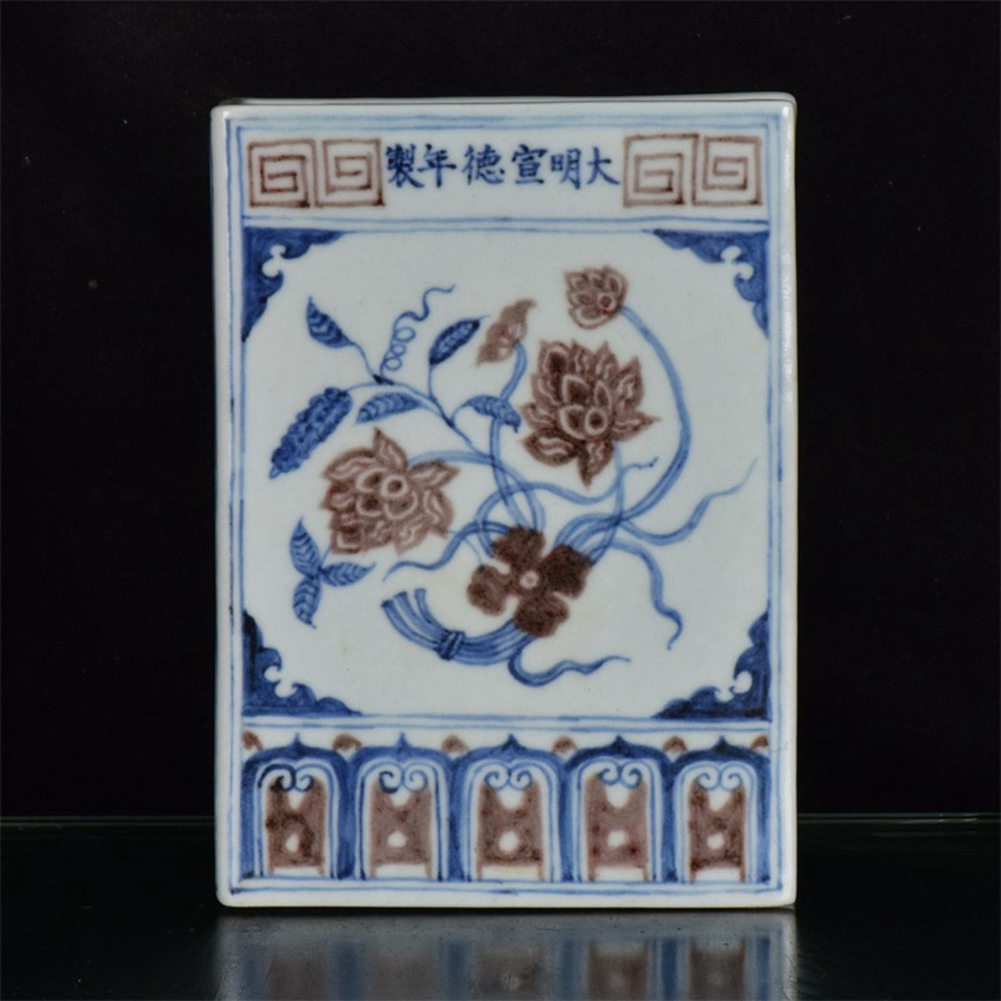 Chinese antique blue and white glazed book sculptures with red floral patterns