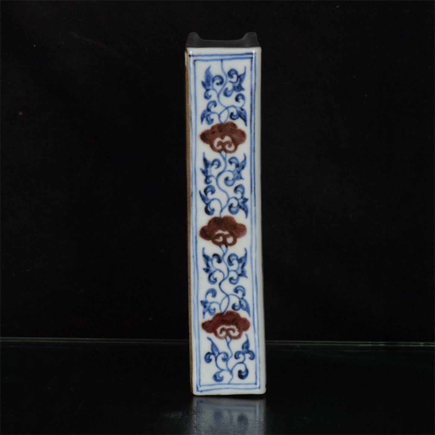 Chinese antique blue and white glazed book sculptures with red floral patterns