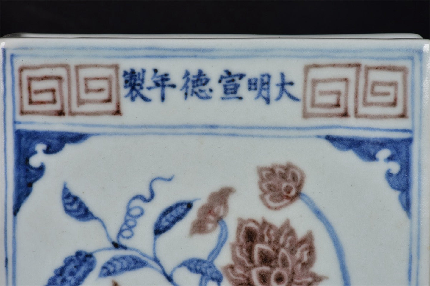 Chinese antique blue and white glazed book sculptures with red floral patterns