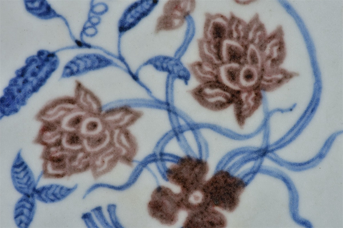 Chinese antique blue and white glazed book sculptures with red floral patterns