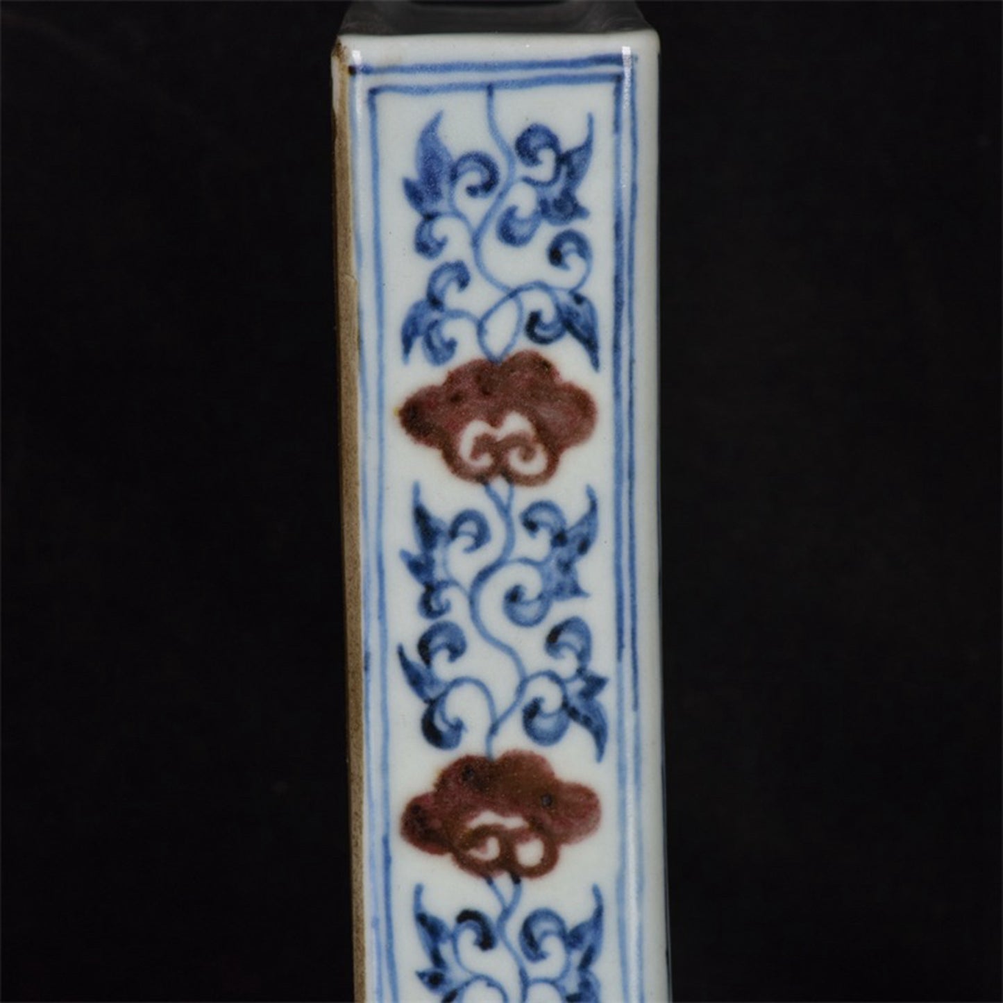 Chinese antique blue and white glazed book sculptures with red floral patterns