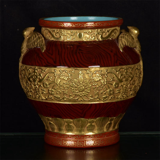 Chinese antique woodgrain relief gold-plated swallow jar