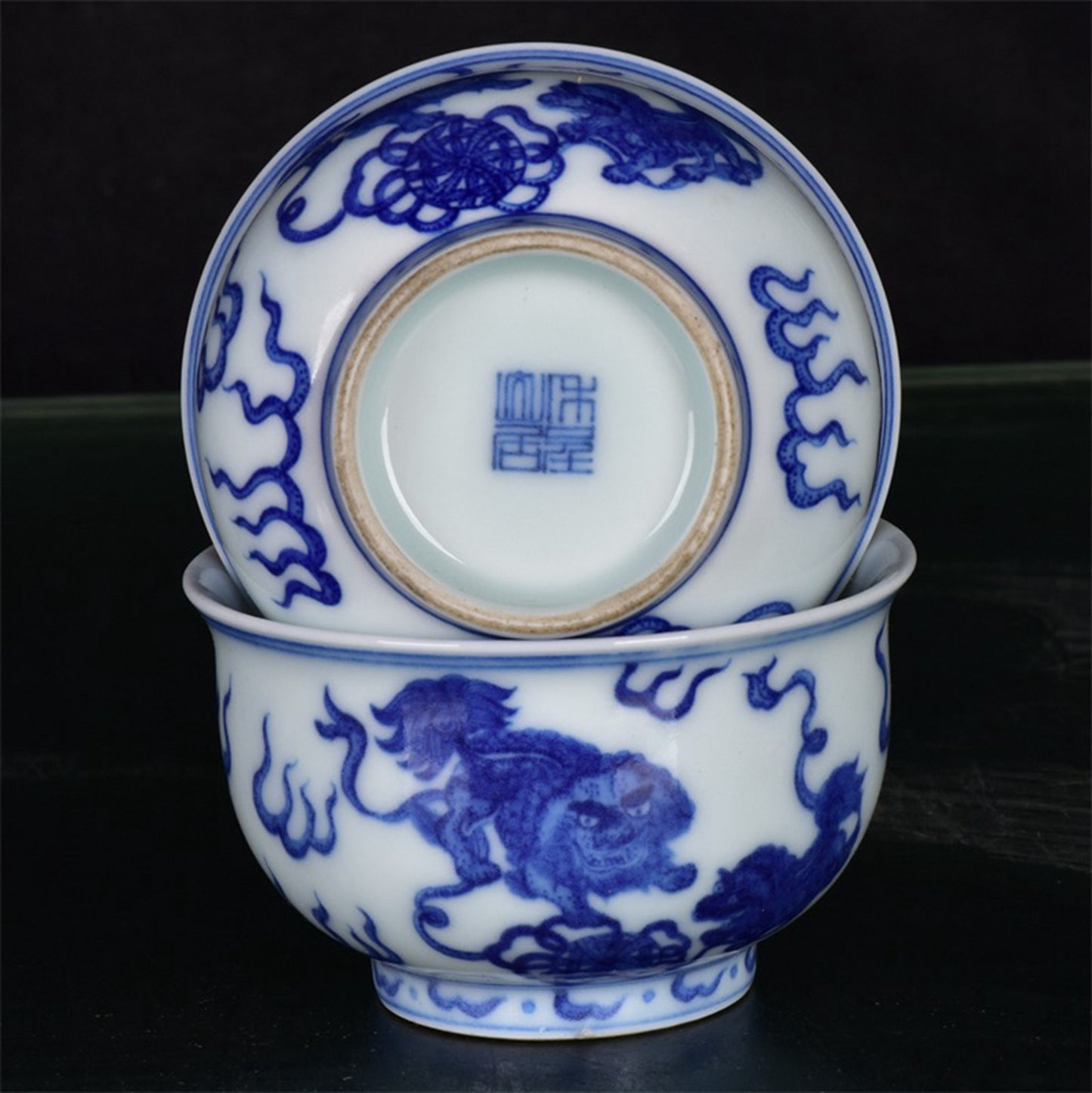 Chinese antique blue and white lion rolling embroidered ball pattern cup