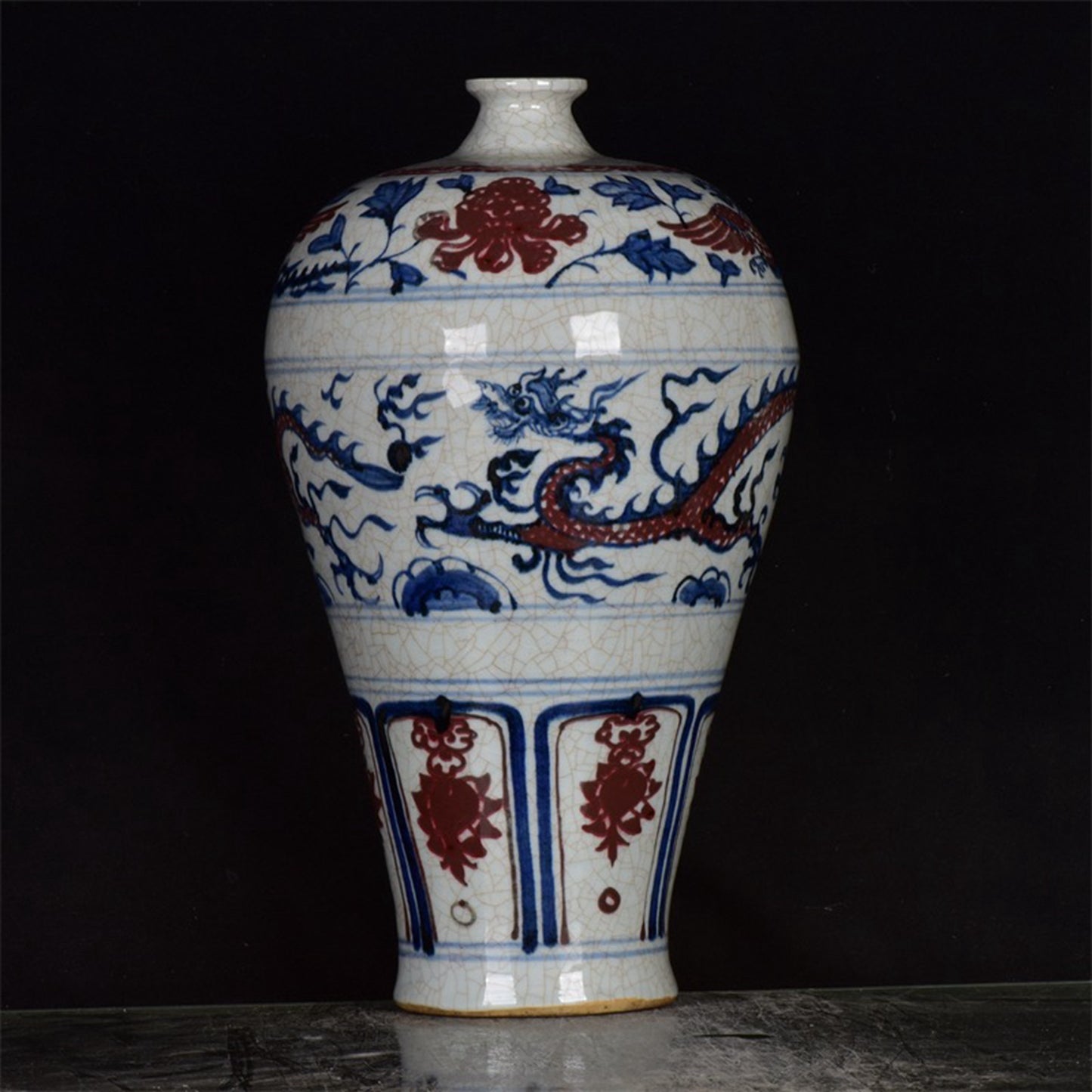 Chinese antique blue and white glazed red dragon patterned open leaf plum vase