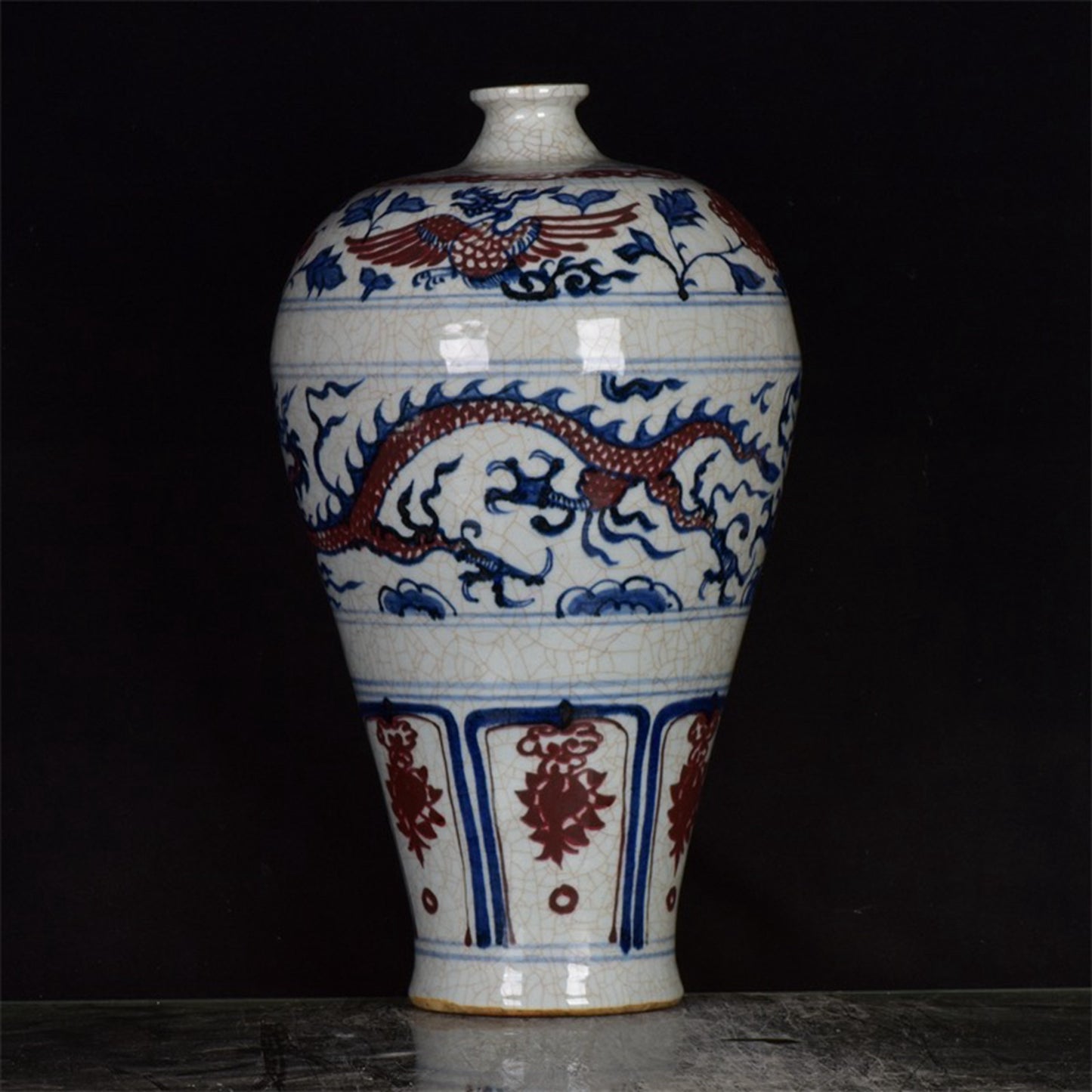Chinese antique blue and white glazed red dragon patterned open leaf plum vase