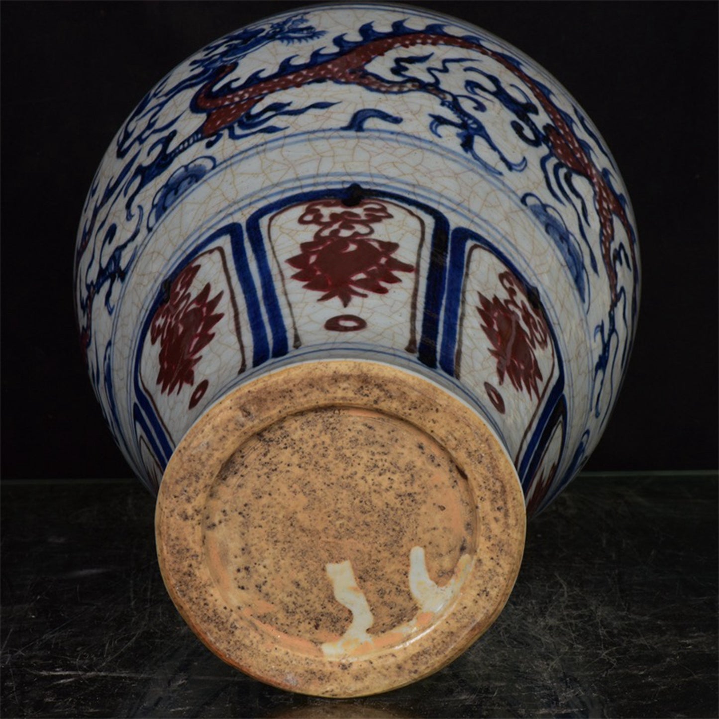 Chinese antique blue and white glazed red dragon patterned open leaf plum vase