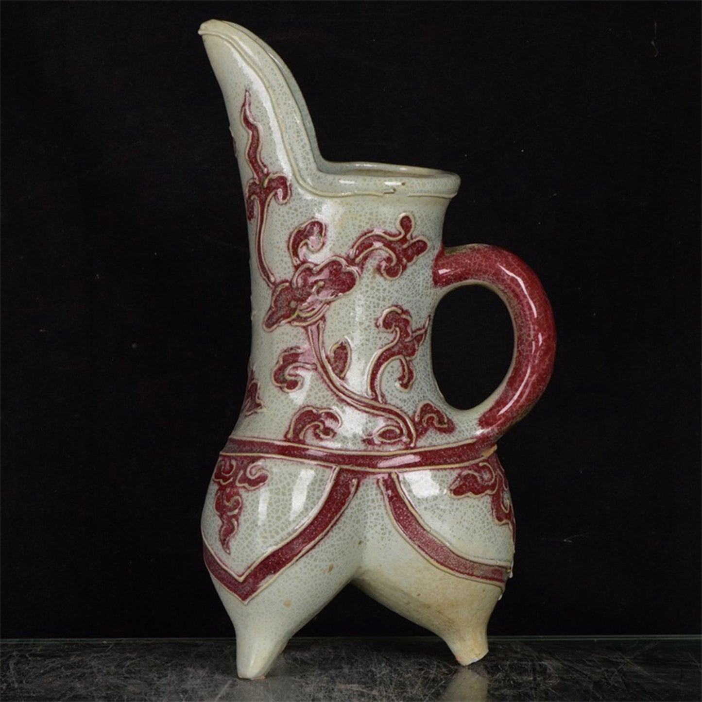 Chinese antique glazed red flower patterned three legged cup