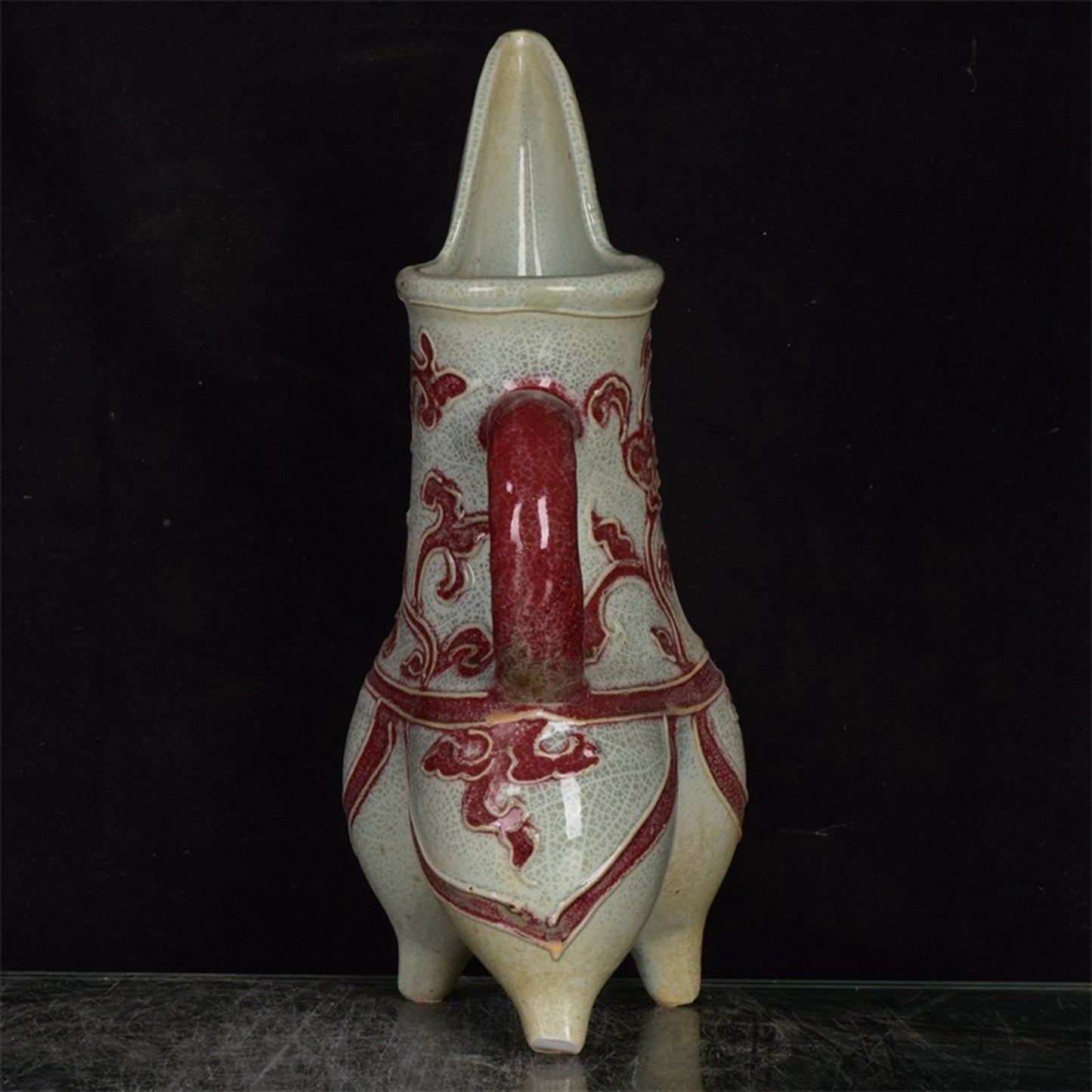 Chinese antique glazed red flower patterned three legged cup
