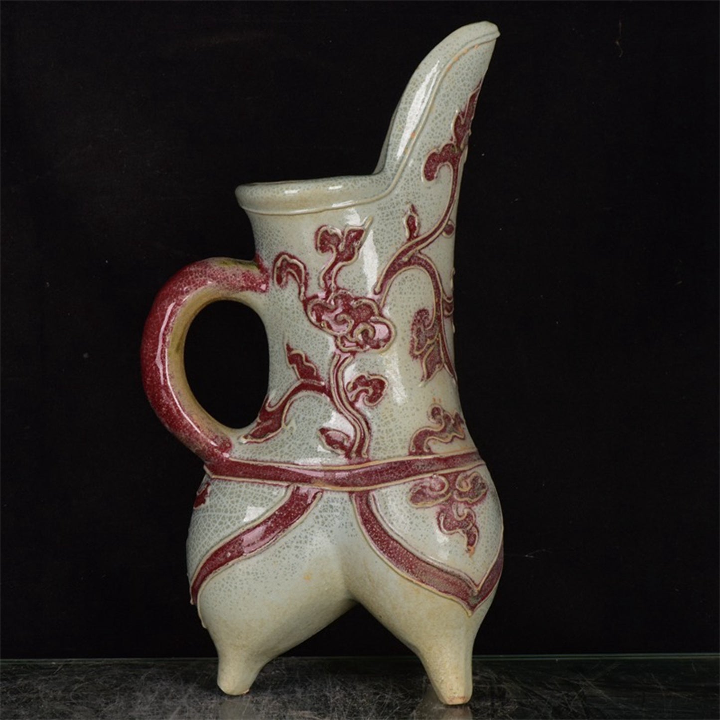 Chinese antique glazed red flower patterned three legged cup