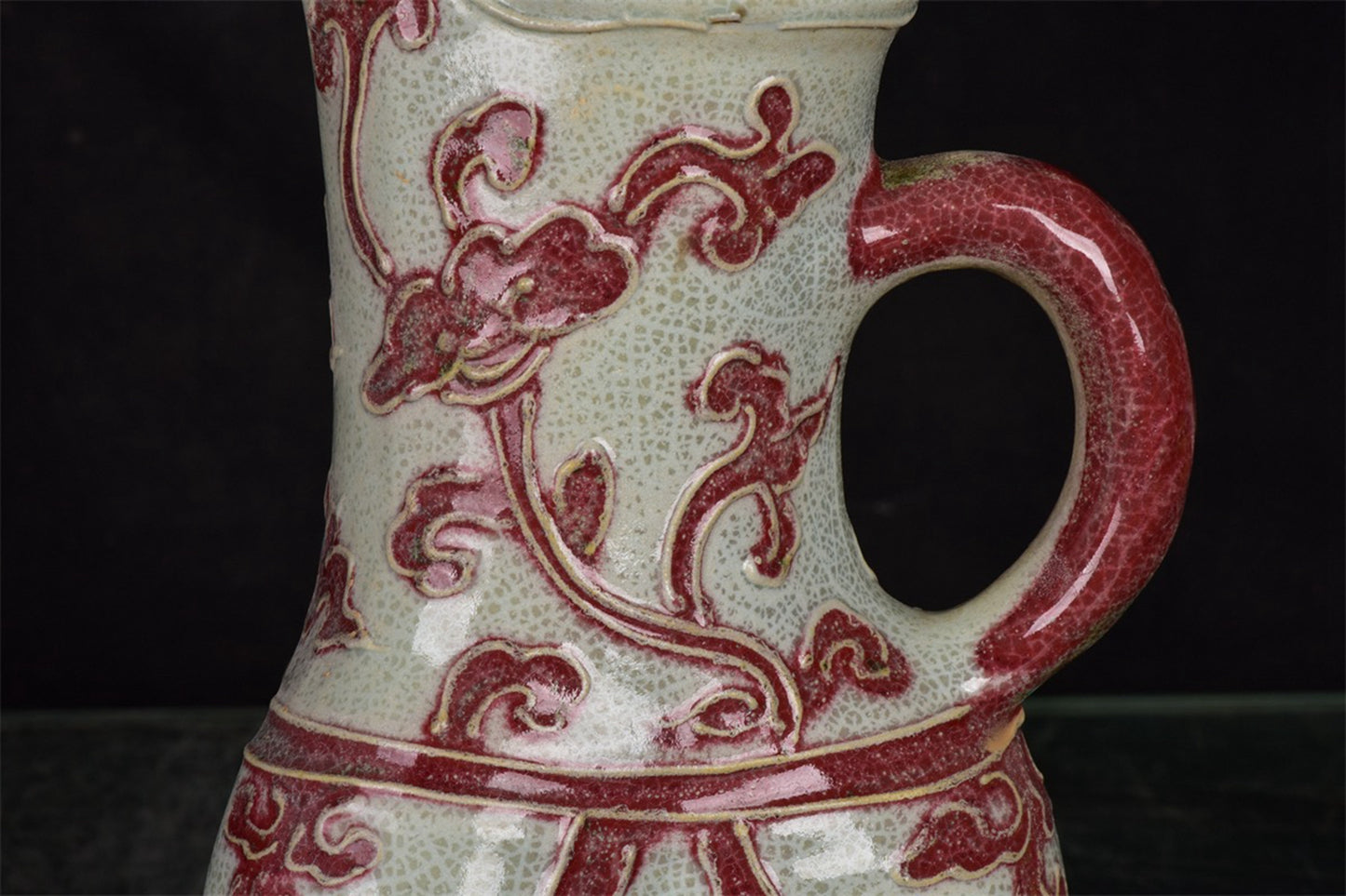 Chinese antique glazed red flower patterned three legged cup