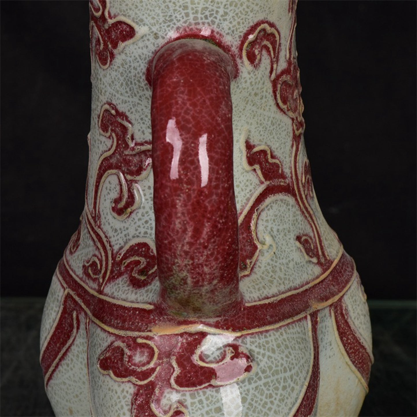 Chinese antique glazed red flower patterned three legged cup