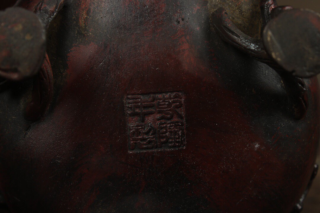 A Chinese antique pure copper incense burner with delighted eyebrows