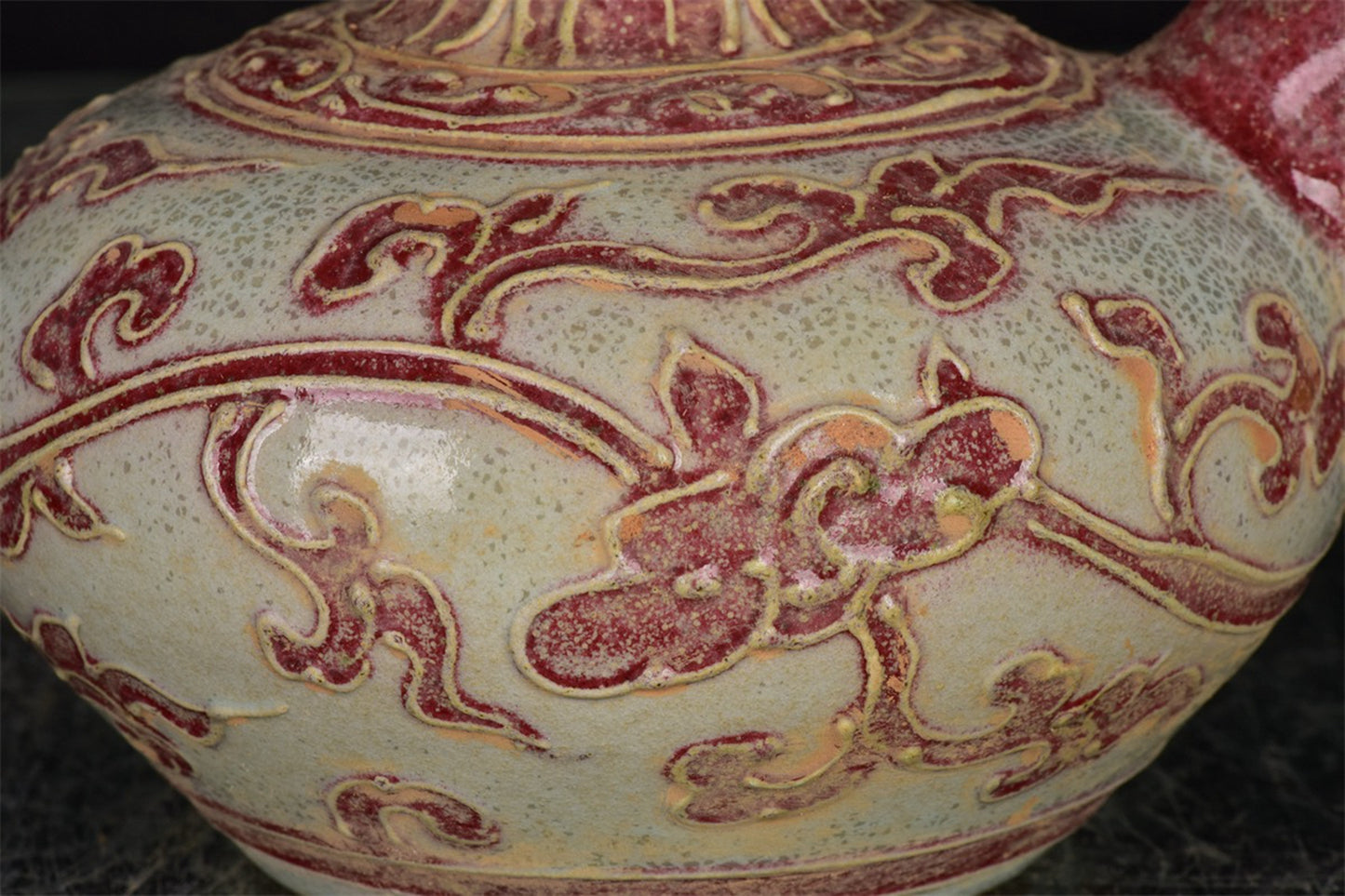 Chinese antique relief vase with tangled branches and floral patterns