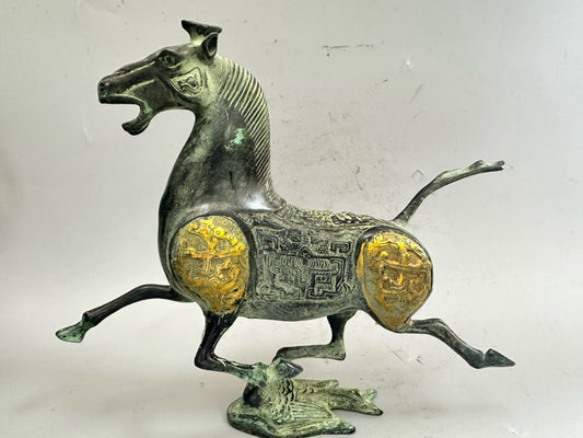 Pure copper antique gilded golden horse steps on a flying swallow