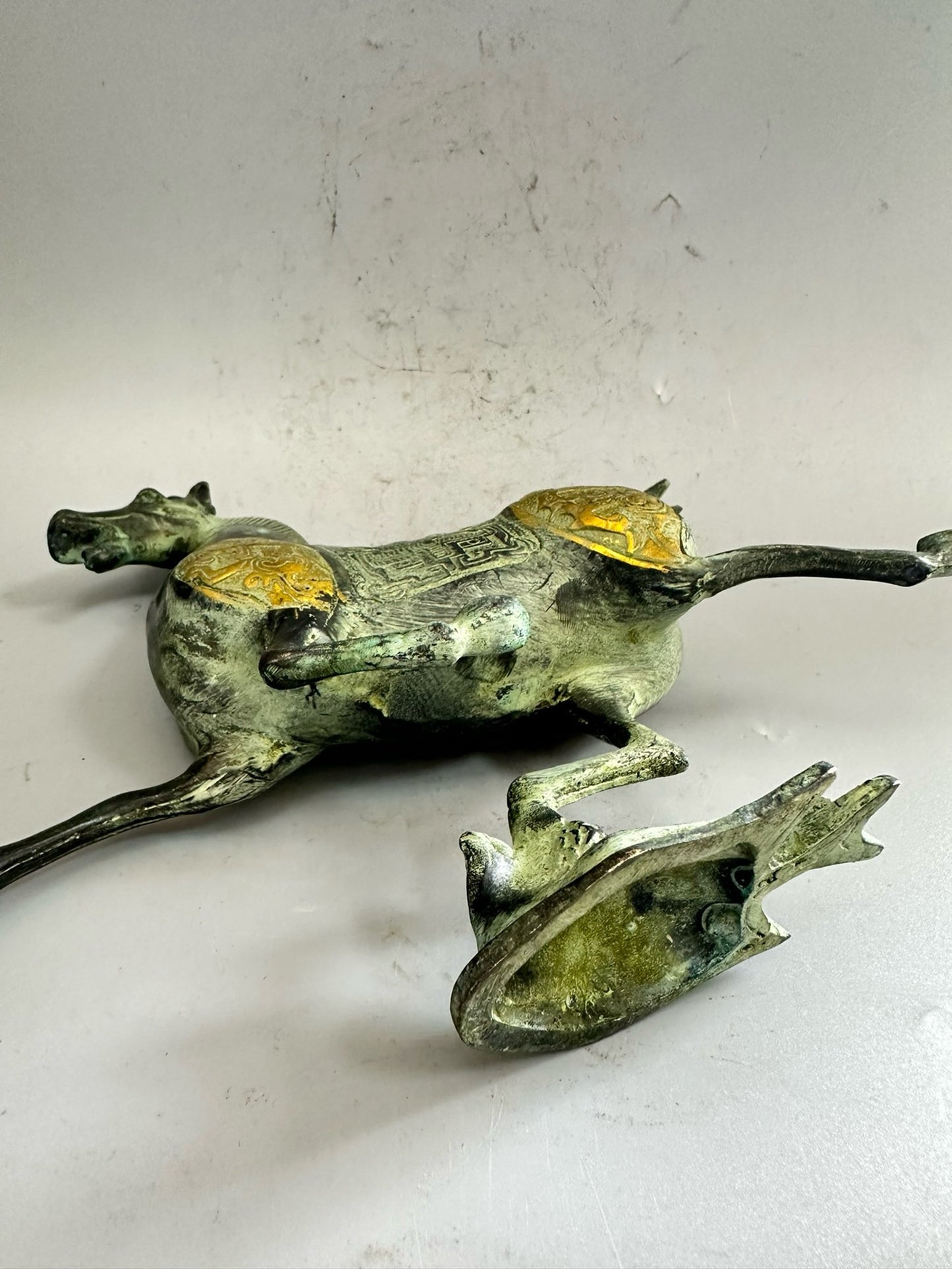 Pure copper antique gilded golden horse steps on a flying swallow